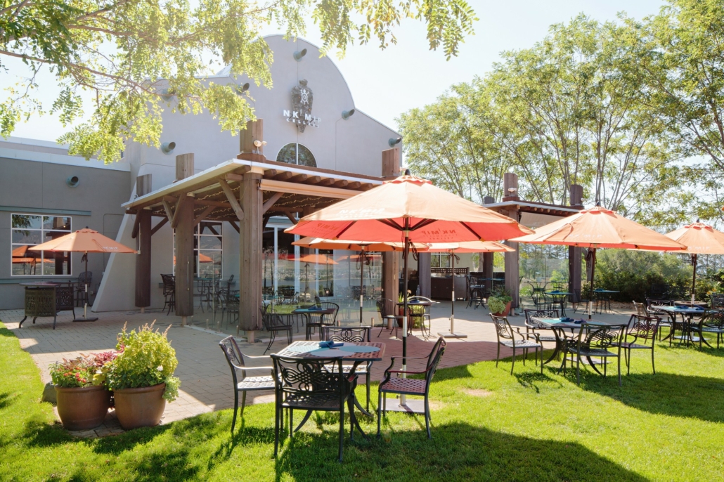 The first Indigenous winery in North America, Nk’Mip Cellars tasting room and patio on a sunny day in Osoyoos, BC.