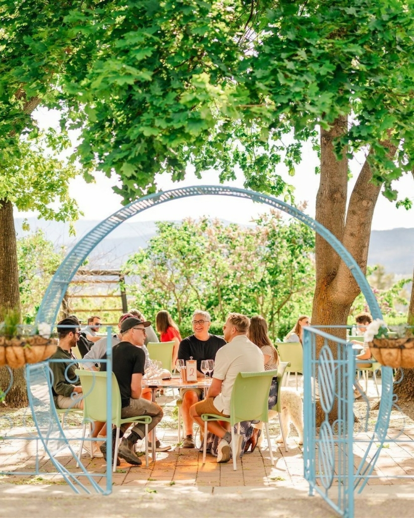Guesting dining on the lush patio at Elephant Island Winery.