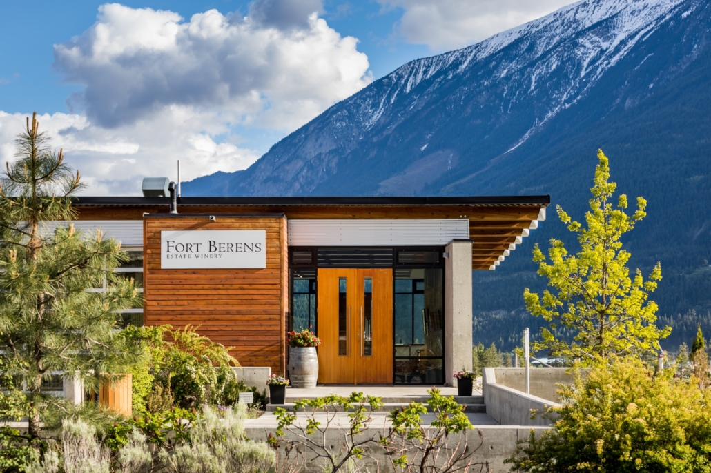The modern Fort Berens Winery located in Lillooet with the scenic snow-capped BC mountains in the background.